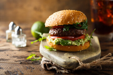 Traditional beef burger with guacamole