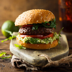 Traditional beef burger with guacamole