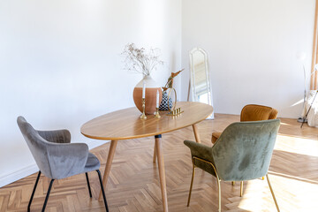 expensive modern light luxury interior design of a spacious living room with wooden elements and white walls. filled with original and unusual decorative things