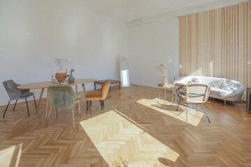 expensive modern light luxury interior design of a spacious living room with wooden elements and white walls. filled with original and unusual decorative things
