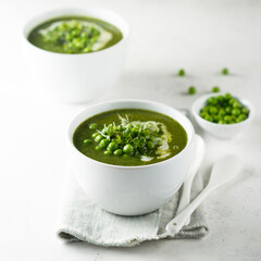 Healthy green pea soup with cream