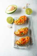 Homemade salmon bruschetta with avocado