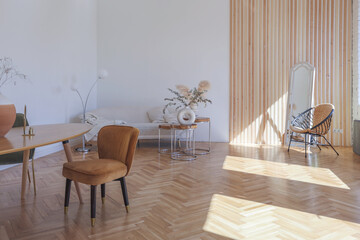 expensive modern light luxury interior design of a spacious living room with wooden elements and white walls. filled with original and unusual decorative things