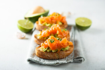 Homemade salmon bruschetta with avocado