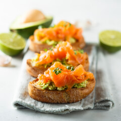 Homemade salmon bruschetta with avocado