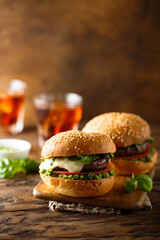 Traditional homemade beef burgers with pesto sauce