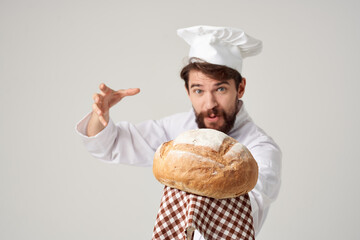 male cook with bread in hand culinary industry