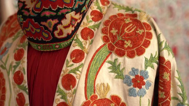 Shop of traditional embroidery of Uzbekistan, bright ornaments in the national style, history and relics. Shop of national clothing and embroidery. National pattern of Uzbekistan