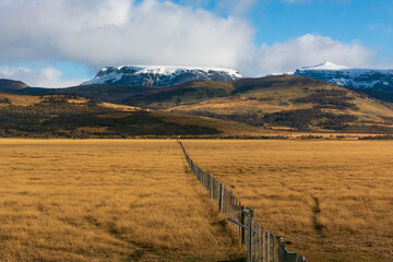 Obraz premium Mountain landscape, natural scenery of Chile. Popular travel destination in South America: Torres del Paine National Park. Amazing autumn.