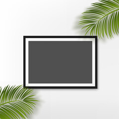 Black photo frame with palm leaves on white background. Vector