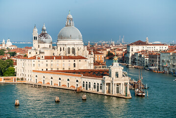 Fototapeta na wymiar Venice, Italy: Basilica di Santa Maria della Salute und Punta della Dogana, Grand Canal. In the morning sun