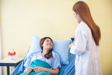 Obraz premium Woman doctor and patient consultation with professional specialist diagnostics at hospital medicare treatment clinic. Doctor talking to patient for medical health care therapy. Healthy medical concept