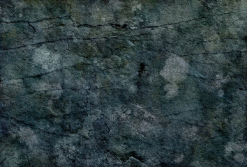 ひびのある黒ずんだ古い壁