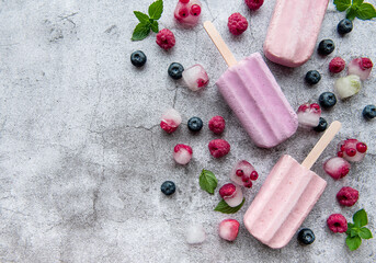 Fototapeta na wymiar Homemade raspberry and blueberry ice cream