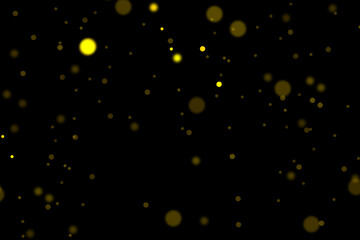 Abstract background from golden glittering lights.