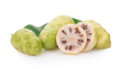 Noni or Morinda Citrifolia fruits with sliced and green leaf isolated on white background
