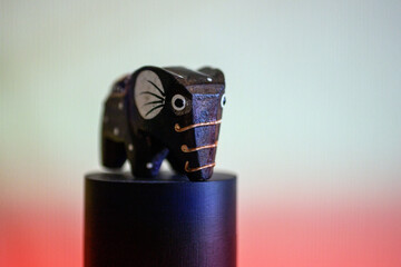 Closeup shot of a small wooden elephant figurine