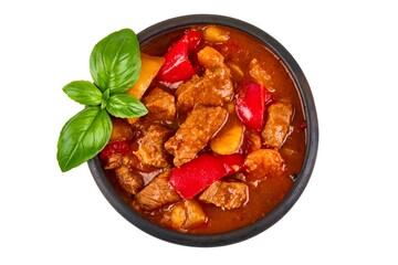 Hungarian goulash, pork stew, isolated on white background.