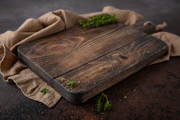 Brown background with cutting board for food photography. Free space for text
