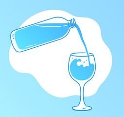 Bottle pouring down water in glass
