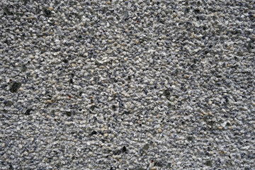 Wall covered with small stones.