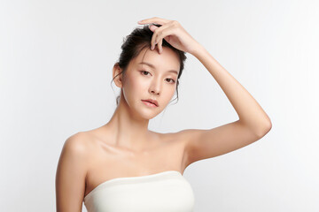 Naklejka premium Beautiful young asian woman with clean fresh skin on white background, Face care, Facial treatment, Cosmetology, beauty and spa, Asian women portrait.