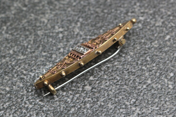 Gilded and silver-plated Victorian brooch with pearls.