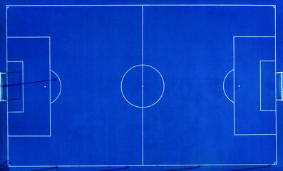 Aerial view of blue artificial turf futsal field.