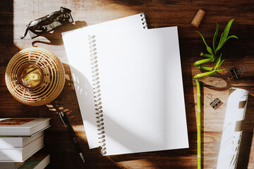 Spiral notebooks on the workplace mockup. 3D rendering