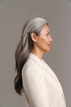 Mature Asian Woman With White Hair Posing In Profile