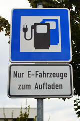Sign: Parking for charging only