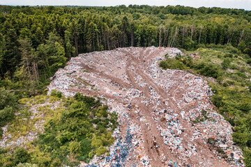 Destruction of forests and ecological system by garbage removal in forests, top view, destructive...