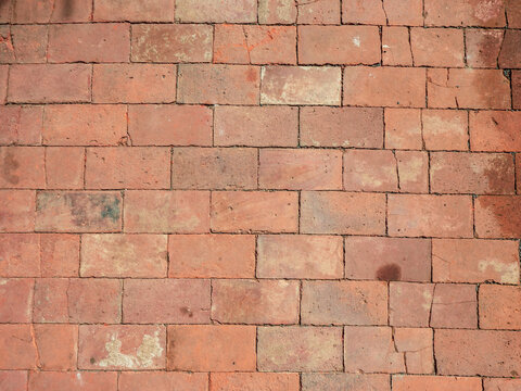 Clay ancient brick flooring tilles. Historical tilled pavement