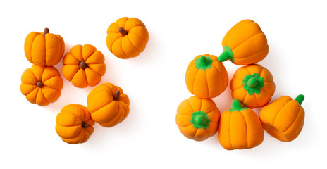 Pumpkin candies isolated on white background, top view