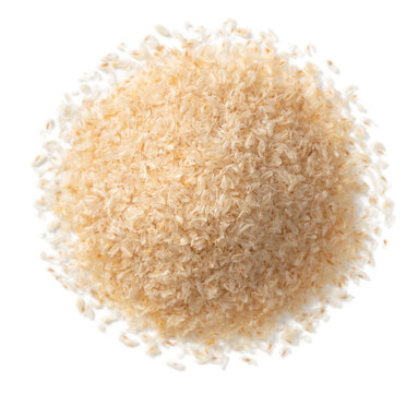 Whole psyllium husks isolated on white background, top view