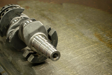 Newly fabricated steel crankshaft. The main part of internal combustion engines.