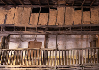 old wooden and adobe house, abandoned