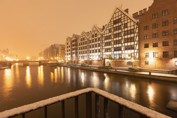 Fototapeta na wymiar Gdansk in the evening with snow