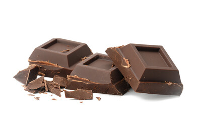broken black chocolate with pieces isolated on white background. Dessert bar of chocolate, close up