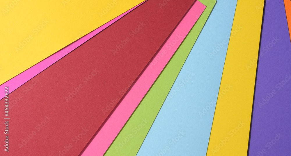 Poster abstract bright background from multicolored paper, backdrop for designer