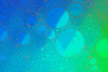 Аbstract image of oil and water bubbles of various colors. Colorful artistic image of oil drop on water for modern and creation design background.