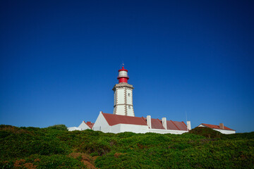 Fototapeta na wymiar Cape Espichel lighthouse in Sesimbra, Portugal