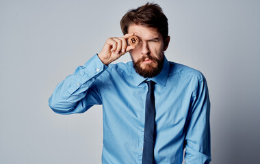 man with gold coin finance office manager