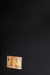 European banknotes on a black background, rain of money, human investment in currency.