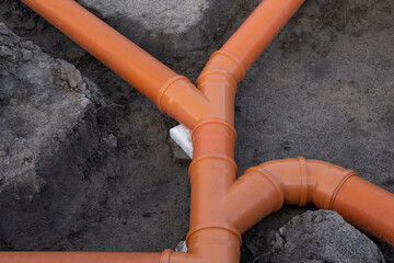 Prepared Drainage System from Plastic pipes made by plumber in the ground during the building of a...