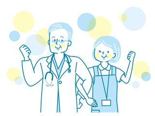 腕を組んで笑顔のシニア医療従事者