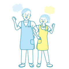 腕を組んで笑顔のシニア医療従事者