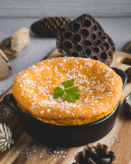 Sweet potato cake decorated with dry leaves