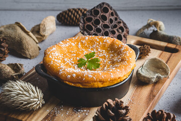 Sweet potato cake decorated with dry leaves