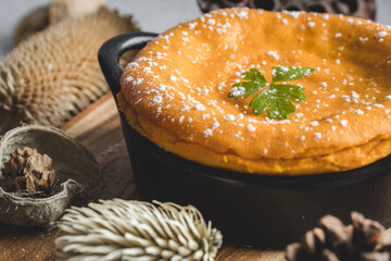 Sweet potato cake decorated with dry leaves